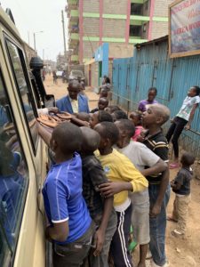 Kids getting candy when we arrived Antioch Baptist Church Githurai District Nairobi Slums